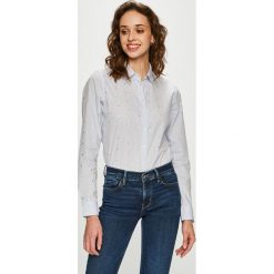 Tommy Hilfiger - Koszula. Niebieskie koszule damskie Tommy Hilfiger, bez wzorów, z bawełny, casualowe, bez kołnierzyka, bez ramiączek. W wyprzedaży za 219.90 zł.