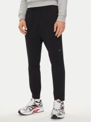 Reebok Spodnie dresowe Actic Coll Dreamblend 100075686 Czarny Regular Fit. Czarne spodnie dresowe męskie Reebok, bez wzorów, z bawełny. Za 219.99 zł.
