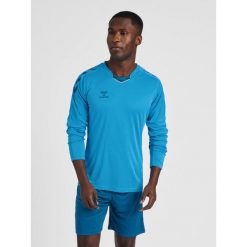 Koszulka Hmlcore dla dorosłych. Niebieskie bluzki damskie HUMMEL, bez wzorów, z poliesteru, bez kołnierzyka. Za 145.50 zł.