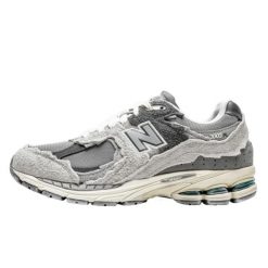Buty do chodzenia dla dorosłych New Balance 2002R Protection Pack Rain Cloud. Szare buty sportowe na co dzień damskie New Balance, bez wzorów, trekkingowe. W wyprzedaży za 1,303.60 zł.