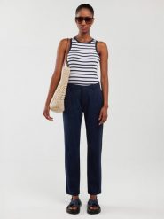 BIG STAR Spodnie chino w kolorze granatowym rozmiar: W28/L32. Niebieskie spodnie materiałowe damskie Big Star, bez wzorów, retro, z podwyższonym stanem. Za 107.99 zł.