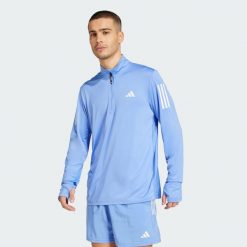 Bluza Own The Run Half-Zip. Niebieskie bluzy bez kaptura męskie Adidas, xl. Za 219.00 zł.