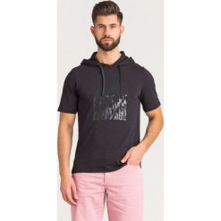 T-SHIRT Armani Exchange. Czarne t-shirty męskie Armani Exchange, l, z aplikacjami, z bawełny, bez kołnierzyka. Za 179.40 zł.