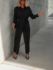 Milan Kiss Kombinezon w kolorze czarnym rozmiar: XL. Czarne kombinezony damskie Milan Kiss, xl, bez wzorów, bez kołnierzyka, bez ramiączek. Za 143.56 zł.