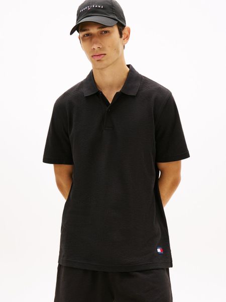 Tommy Jeans koszulka polo Mężczyźni czarny, S. Czarne koszulki polo męskie Tommy Jeans, m, bez wzorów, z bawełny, bez ramiączek. Za 279.95 zł.