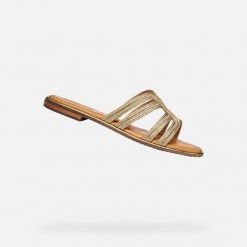 Sandały GEOX D SOZY PLUS Złoty. Żółte sandały damskie Geox, bez wzorów, ze skóry, bez obcasa. Za 349.99 zł.