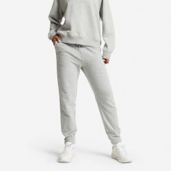 Spodnie dresowe damskie Domyos Gym & Pilates. Szare spodnie dresowe damskie DOMYOS, s, z bawełny, na jogę i pilates. Za 89.99 zł.