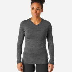 Koszulka trekkingowa damska Forclaz Travel 500 merino. Czarne bluzki damskie FORCLAZ, l, bez wzorów, z jersey, sportowe, bez kołnierzyka, bez ramiączek. Za 129.99 zł.