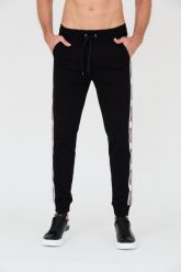 MOSCHINO Czarne spodnie dresowe z lampasami. Czarne spodnie dresowe męskie MOSCHINO, bez wzorów, z dresówki. W wyprzedaży za 559.99 zł.