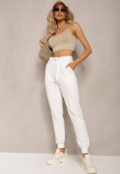 Białe Dresowe Spodnie High Waist z Błyszczącym Sznurkiem w Pasie Darciasa. Białe spodnie dresowe damskie Renee, m, bez wzorów, z dresówki. Za 29.99 zł.