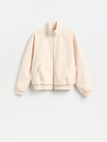 Sztruksowa bluza ze stójką - kremowy. Białe bluzy bez kaptura męskie Reserved, l, z dzianiny. Za 149.99 zł.