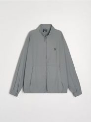 Kurtka wiatrówka SNSY PERFORMANCE - szary. Szare kurtki męskie Sinsay, l, bez wzorów, bez kaptura. Za 89.99 zł.