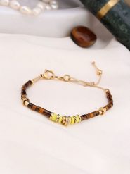 Charlize Pozłacana bransoletka z tygrysim okiem rozmiar: onesize. Brązowe bransoletki damskie Charlize, pozłacane. Za 95.69 zł.