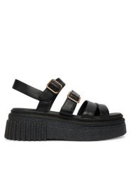 Clarks Sandały Evamar Strap 26185888 Czarny. Czarne sandały damskie Clarks, bez wzorów, ze skóry, bez obcasa, na płaskiej podeszwie. Za 519.99 zł.