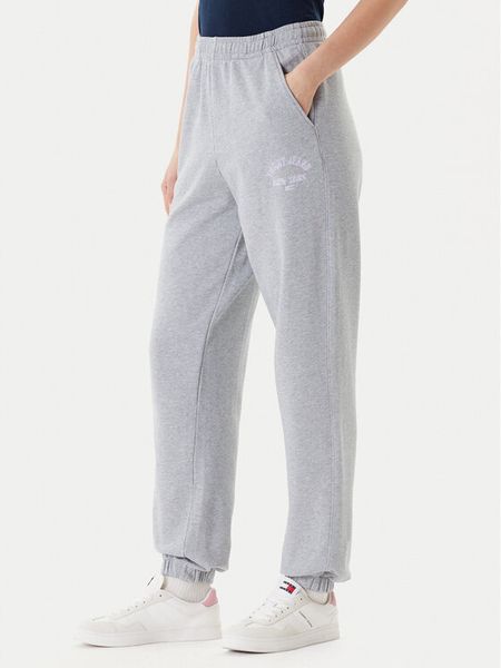 Tommy Jeans Spodnie dresowe Varsity DW0DW20994 Szary Regular Fit. Szare jeansy damskie Tommy Jeans, s, bez wzorów, z bawełny. Za 229.99 zł.