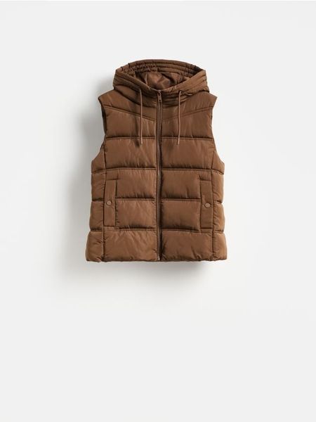 Pikowana kamizelka - ciemnobrązowy. Brązowe kamizelki damskie Reserved, l, z tkaniny. Za 119.99 zł.