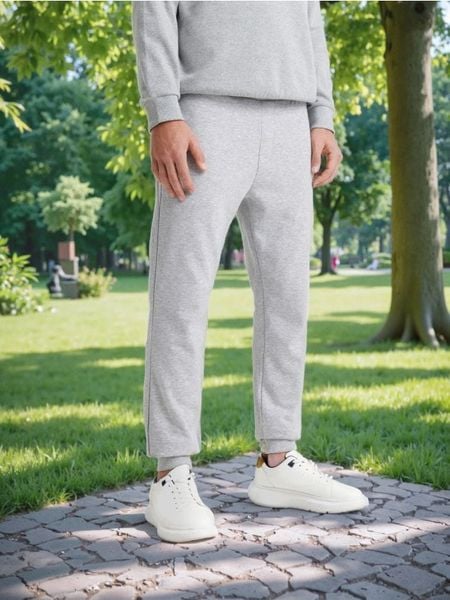 Spodnie dresowe slim jogger - szary. Szare spodnie sportowe męskie Sinsay, z dresówki. W wyprzedaży za 14.99 zł.