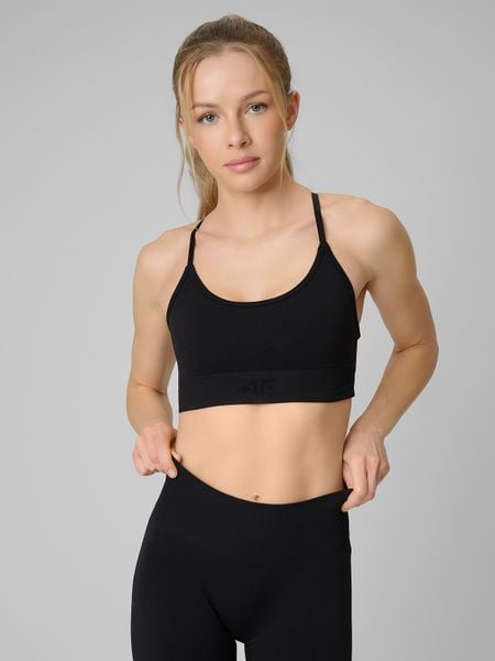 4F Biustonosz treningowy bezszwowy z niskim wsparciem damski - czarny M/L. Czarne biustonosze sportowe damskie 4f, bez wzorów, ze skóry. Za 99.99 zł.