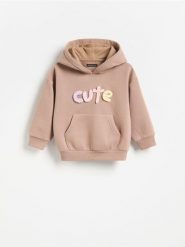 Bluza z kapturem - beżowy. Brązowe bluzy i bluzki niemowlęce Reserved, bez wzorów, z bawełny, bez ramiączek, z kapturem. Za 55.99 zł.
