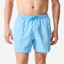 Spodenki surfingowe męskie Decathlon 100 Pomięte 15". Niebieskie kąpielówki męskie Decathlon, m, bez wzorów, z materiału. Za 69.99 zł.