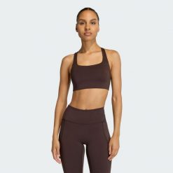 Biustonosz Optime Workout ze średnim wsparciem. Brązowe biustonosze sportowe damskie Adidas, bez wzorów. Za 199.00 zł.