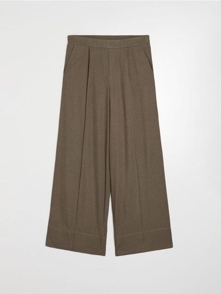 Spodnie wide leg z wiskozą i domieszką lnu - brązowy. Brązowe spodnie materiałowe damskie Sinsay, bez wzorów, z wiskozy. Za 49.99 zł.
