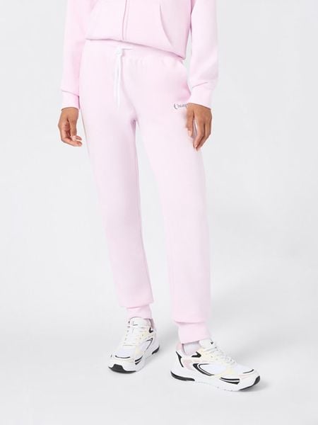 Champion Spodnie dresowe w kolorze jasnoróżowym rozmiar: M. Różowe spodnie dresowe damskie CHAMPION, m, bez wzorów, z bawełny. Za 104.99 zł.