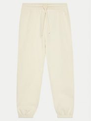 United Colors Of Benetton Spodnie dresowe 39M2CF05I Beżowy Regular Fit. Brązowe spodnie dziewczęce United Colors Of Benetton, z bawełny. Za 79.99 zł.