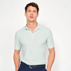Koszulka polo do golfa z krótkim rękawem męska Inesis WW500. Niebieskie koszulki polo męskie INESIS, l, bez wzorów, z materiału, bez ramiączek. Za 79.99 zł.