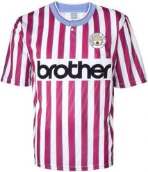 Koszulka wyjazdowa Manchester City retro 1988/89 Burgundy Mix. Czerwone t-shirty damskie MANCHESTER CITY, xl, bez wzorów, z materiału, bez kołnierzyka. Za 233.99 zł.
