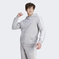 Bluza męska adidas Essentials Fleece 3-Stripes Hoodie. Białe bluzy z kapturem męskie Adidas, l, z materiału. Za 219.00 zł.