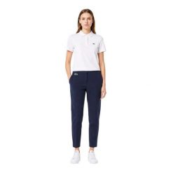 Spodnie turystyczne damskie Lacoste Chino. Niebieskie spodnie sportowe damskie Lacoste, uniwersalny, z materiału, trekkingowe. Za 367.00 zł.