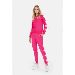 Spodnie fitness damskie Cardio Bunny Jenny. Czerwone spodnie dresowe damskie Cardio Bunny, l, z bawełny, na fitness i siłownię. Za 99.00 zł.