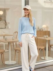 Ażurowy sweter z bawełną - błękitny. Niebieskie swetry klasyczne damskie Sinsay, l, z bawełny, bez kołnierzyka. Za 49.99 zł.