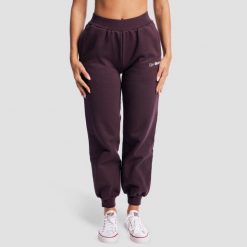 Spodnie damskie fitness jogger oversize z kieszeniami. Fioletowe spodnie sportowe damskie GYMBEAM, l, z bawełny, na fitness i siłownię. Za 143.90 zł.