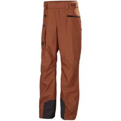 Spodnie narciarskie Helly Hansen Garibaldi 2.0. Brązowe spodnie materiałowe męskie Helly Hansen, bez wzorów, sportowe. Za 1,190.50 zł.