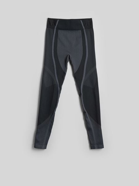 4F Legginsy treningowe bezszwowe damskie - czarne XS/S. Czarne legginsy damskie 4f, s, bez wzorów, z materiału. Za 149.99 zł.
