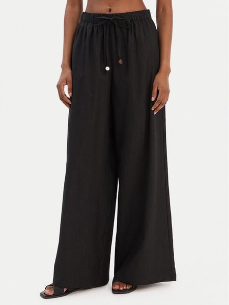 Seafolly Spodnie materiałowe Palermo 55549-PA Czarny Wide Leg. Czarne spodnie materiałowe damskie Seafolly, bez wzorów, z materiału. Za 469.99 zł.