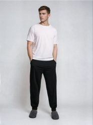 Bawełniane spodnie piżamowe - czarny. Czarne piżamy męskie Sinsay, l, bez wzorów, z bawełny, bez ramiączek. Za 25.99 zł.