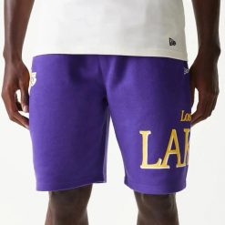 Krótkie Los Angeles Lakers Team Graphic. Czarne szorty męskie New Era, bez wzorów, z bawełny. Za 162.10 zł.