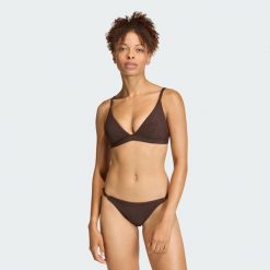 Prążkowana góra bikini Iconisea z wyjmowanymi wkładkami i trójkątnym krojem. Brązowe bikini damskie Adidas, bez wzorów. Za 179.00 zł.