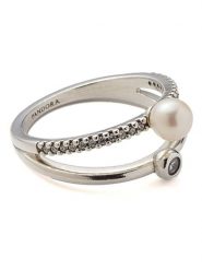 Pandora Srebrny pierścionek z perłą i cyrkoniami rozmiar: 58. Białe pierścionki damskie Pandora, z cyrkonią, srebrne. Za 347.99 zł.