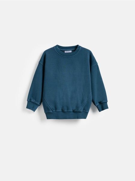 Bawełniana bluza - niebieski. Niebieskie bluzy i bluzki niemowlęce Reserved, bez wzorów, z bawełny, bez ramiączek, bez kaptura. Za 49.99 zł.