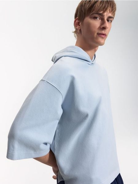 Bluza z krótkim rękawem - jasnoniebieski. Niebieskie bluzy bez kaptura męskie Reserved, l, z bawełny. Za 129.99 zł.