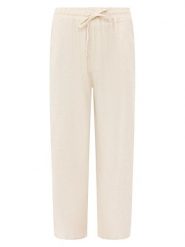 Zwillingsherz Spodnie w kolorze beżowym rozmiar: onesize. Brązowe spodnie materiałowe damskie Zwillingsherz, bez wzorów, z materiału. Za 113.99 zł.