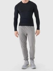 Spodnie treningowe z jednostronnie drapanej dzianiny męskie szare 4F Szary L. Szare spodnie materiałowe męskie 4f, bez wzorów, z dzianiny. Za 179.99 zł.