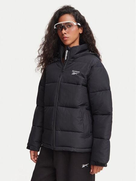 Reebok Kurtka zimowa RCC00113 Czarny Regular Fit. Czarne kurtki damskie Reebok, na zimę, m, bez wzorów, z syntetyku, bez kaptura. Za 449.99 zł.