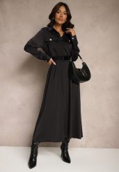Czarna Satynowa Sukienka w Stylu Szmizjerki z Imitacjami Kieszeni i Paskiem Vaminay. Czarne sukienki damskie Renee, l, bez wzorów, z satyny, eleganckie, bez kołnierzyka, bez ramiączek, maxi, kopertowe. Za 99.99 zł.