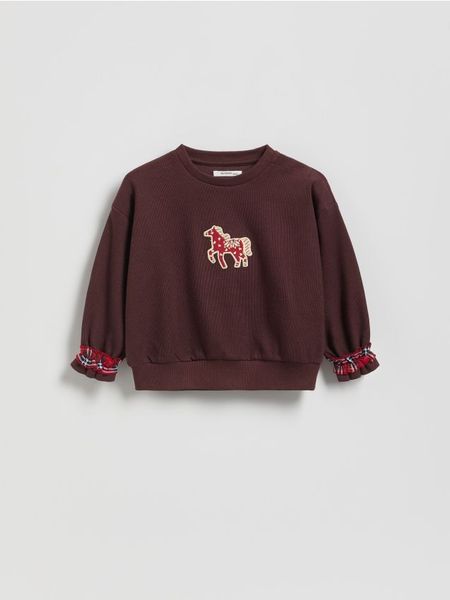 Bawełniana bluza z nadrukiem - ciemnobrązowy. Brązowe bluzy i bluzki niemowlęce Reserved, bez wzorów, z bawełny, bez ramiączek, bez kaptura. Za 55.99 zł.