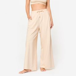 Spodnie fitness damskie Domyos Gym & Pilates 520 Flare. Brązowe spodnie sportowe damskie NYAMBA, xl, z bawełny, na fitness i siłownię. Za 99.99 zł.